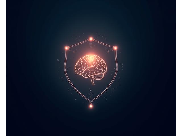 Cerebro humano con engranajes y símbolos de derechos de autor, denotando protección de ideas